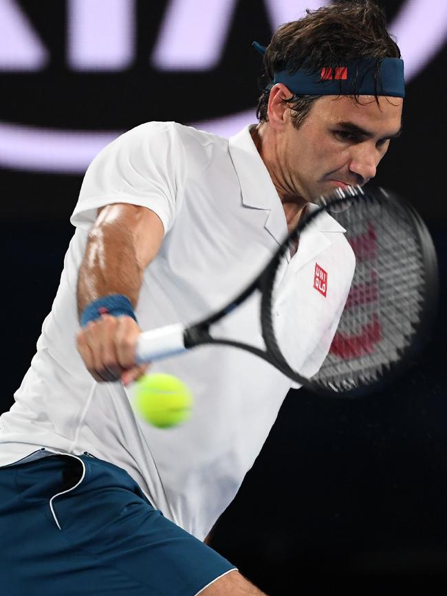 Roger Federer makes another polished return.