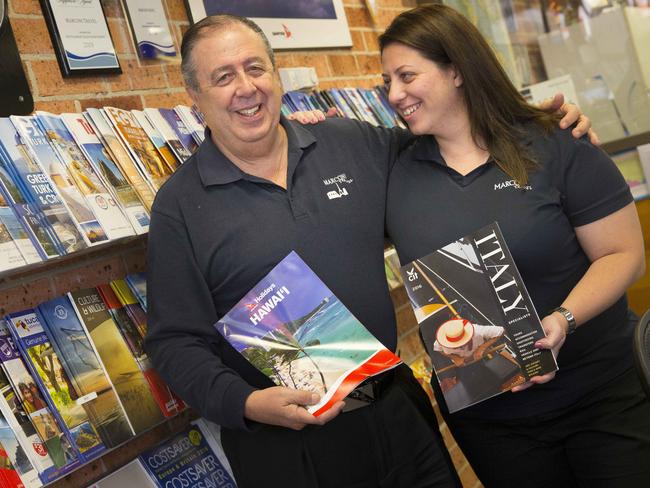 NO BYLINE - Fairfield Advance - Pictured LTR: Domenico Labbozzetta (owner, 68) with daughter Francesca Labbozzetta (36) - Fairfield City Council awarded Marconi Travel Agency (9 William Street, Fairfield NSW) a lifetime business award. Photographs taken at the agency.