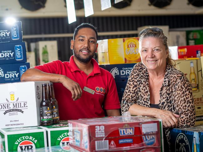 BWS Nightcliff is celebrating a new neighbour as Dan Murphy's takes a step closer to setting up shop in Darwin. Beer Man Anil Sharma and customer Suzie Bee celebrate the news. Picture: Che Chorley