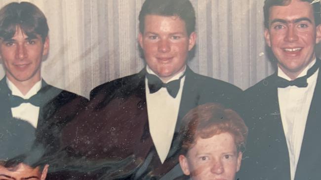 Andrew 'Cosi' Costello (middle) suited up for his formal. Picture: supplied