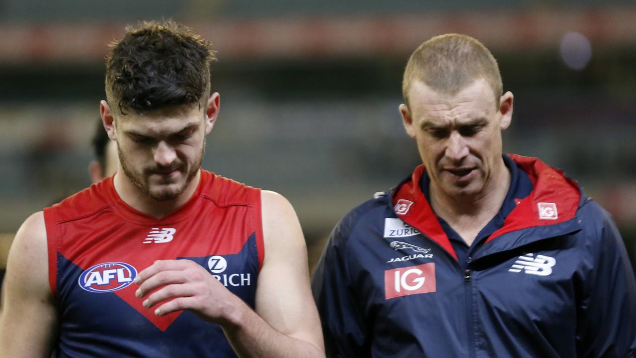 MELBOURNE, AUSTRALIA - AUGUST 03: Angus Brayshaw of the Demons and Senior Coach, Simon Goodwin walk off the M.C.G. after the round 20 AFL match between the Melbourne Demons and the Richmond Tigers at Melbourne Cricket Ground on August 03, 2019 in Melbourne, Australia. (Photo by Darrian Traynor/Getty Images)