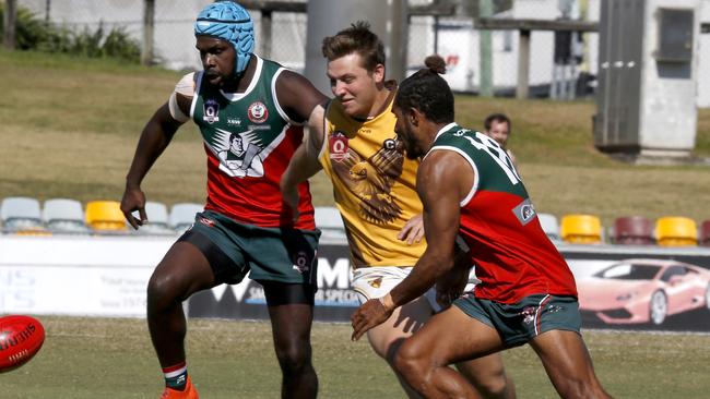 South Cairns’ Dwayne Bosen, Hawks Jack West and South's Parlyane Na'awi. PICTURE: ANNA ROGERS.