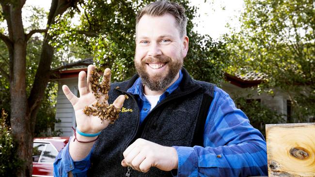 Melbourne Beekeeper Ben Moore knows the secret to well “beeing”. Picture: Nicole Cleary