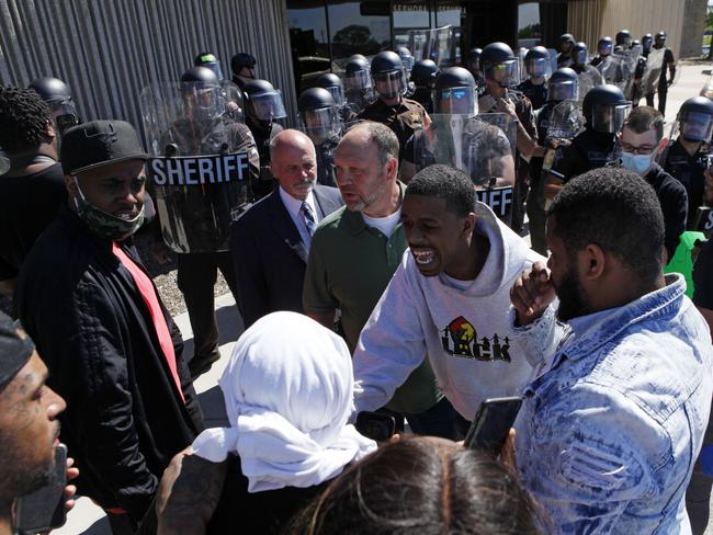 Tensions flare in Hobart, Indiana, during a protest. Picture: AP