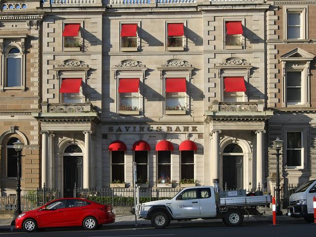 The red awnings on the old Savings Bank of Tasmania building in Murray St before they were taken down in 2012.