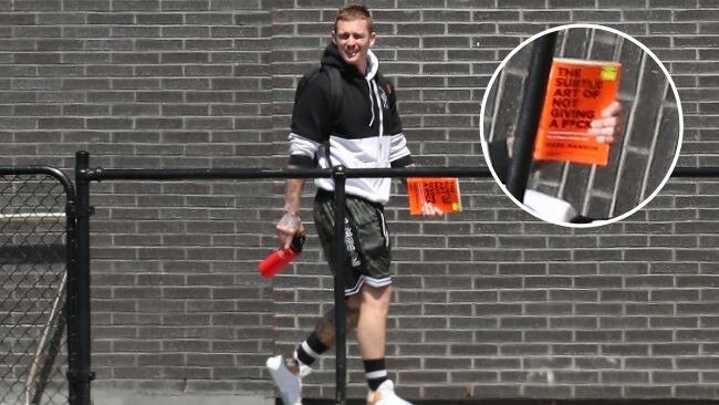 Dayne Beams, pictured with the self-help book 'The Subtle Art of Not Giving A F*ck', at Collingwood training. Picture: AFL Photos