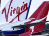 24/07/2003 PIRATE: 08/07/2003. (L-R) Regional Express (REX), Virgin Blue and Qantas planes at Canberra airport. Aviation / Aircraft / Plane / Exterior