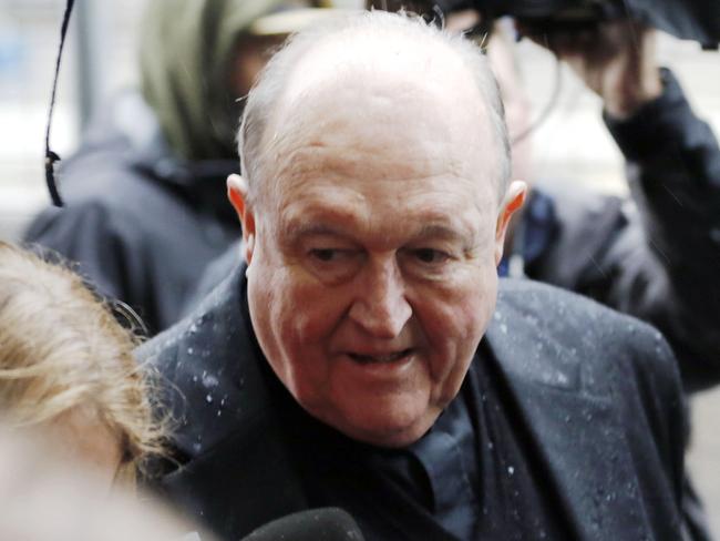 Archbishop Philip Wilson arrives at Newcastle Local Court, in Newcastle, Tuesday, June 19, 2018. The Adelaide Archbishop has been found guilty of concealing historical child sexual abuse. (AAP Image/Darren Pateman)