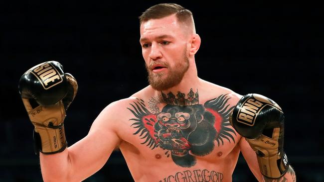 Conor McGregor works out in boxing gloves for UFC 205.