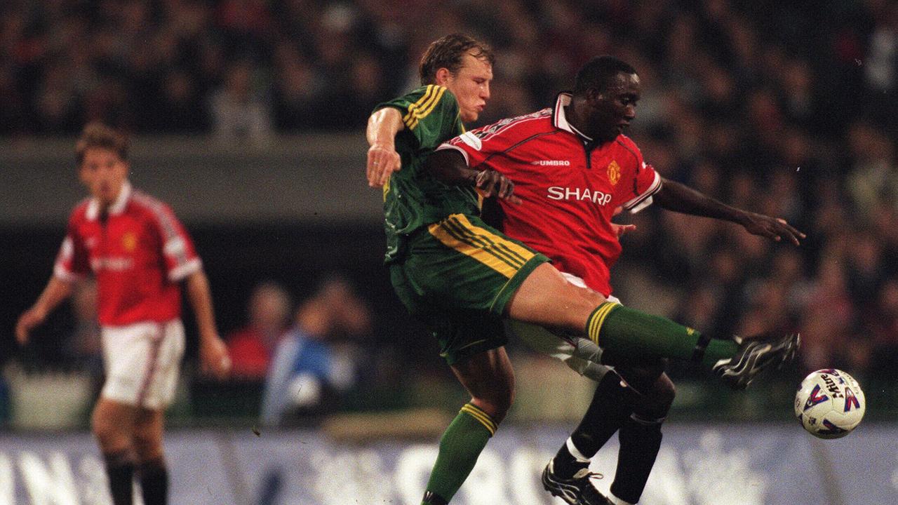 Laybutt competing with Manchester United great Dwight York at the MCG.