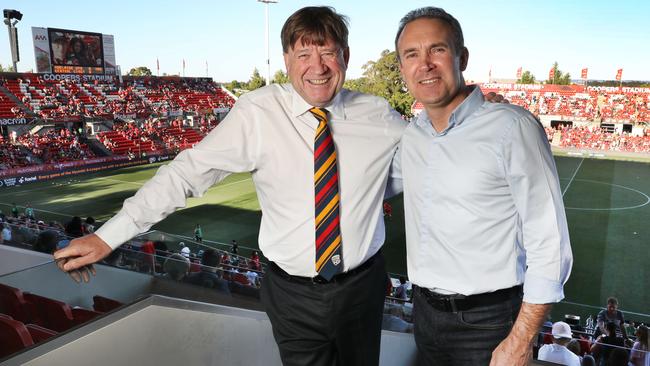 Adelaide-born former England international Tony Dorigo watching his first A-League match in 2017 with ex-Adelaide United chairman Greg Griffin. Picture: AAP Image/Dean Martin