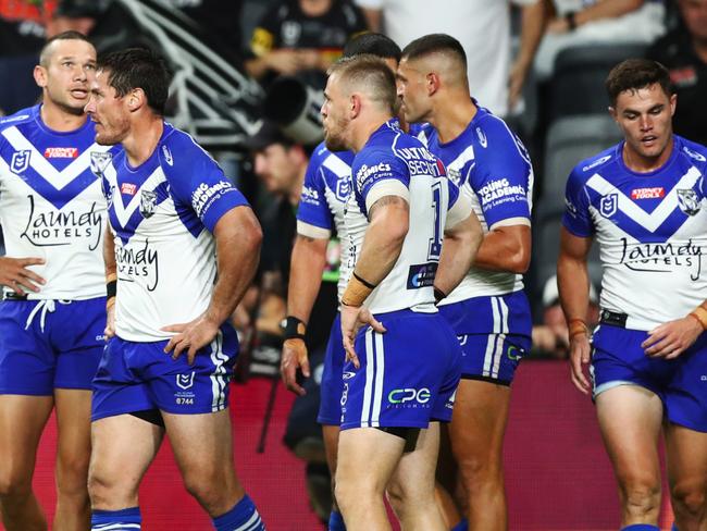 SYDNEY, AUSTRALIA - APRIL 10: Bulldogs look dejected after conceding a try during the round five NRL match between the Canterbury Bulldogs and the Penrith Panthers at CommBank Stadium, on April 10, 2022, in Sydney, Australia. (Photo by Mark Metcalfe/Getty Images)