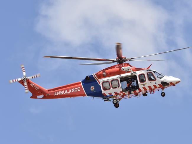 A transformer box (please check), believed to be Powercor, fell into a pit at the junction of Barwon Heads Road and Lake Road in Armstrong Creek on Monday afternoon. A man was injured and flown by air ambulance to the Alfred Hospital in Melbourne. Police, CFA, ambulance, Powercor and ETU and WorkSafe representatives were on site. The road, which already had roadworks on it, was closed while the air ambulance landed. Picture: Alan Barber