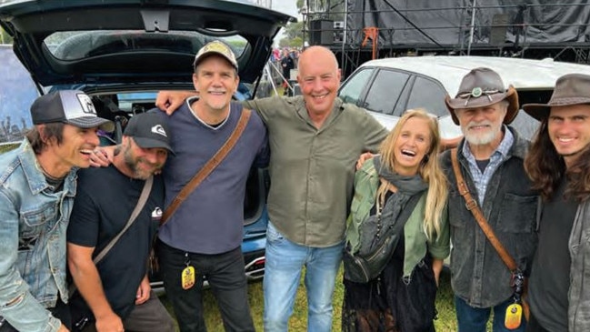 Chambers with her road family which includes dad Bill and Brando (right). Picture: Kasey Chambers / Supplied.