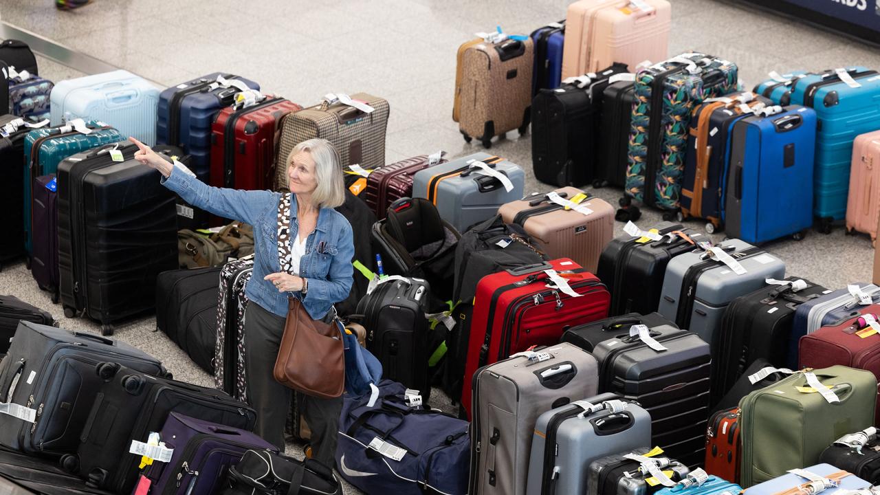 Delta passengers try to find their bags after cancelled flights at Hartsfield-Jackson Atlanta International Airport in Atlanta. Picture: Jessica McGowan/Getty Images via AFP