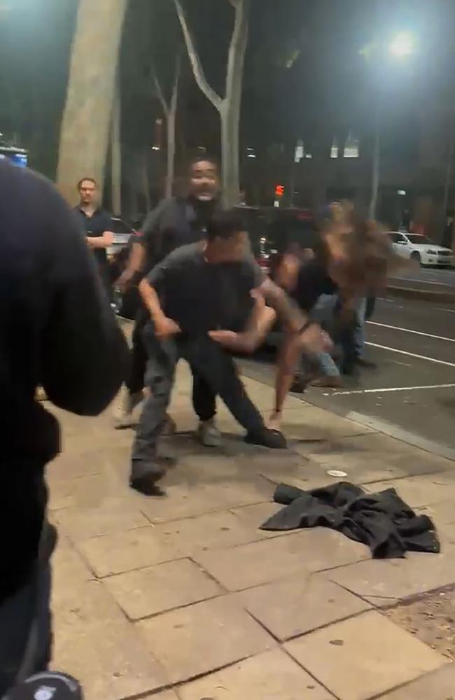 A still from a video showing a woman being struck by a man alleged to be a security guard outside Lambys nightclub in Geelong