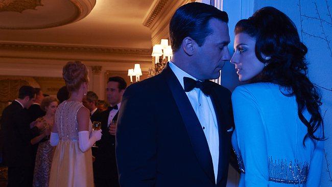 Don Draper (Jon Hamm) and Megan Draper (Jessica Pare)