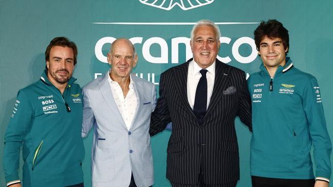 Fernando Alonso, Adrian Newey, Lawrence Stroll, and Lance Stroll pose for a photo. Photo by Zak Mauger/Getty Images for Aston Martin