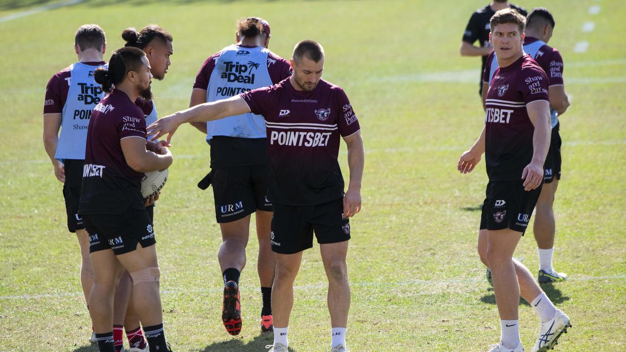 Manly player Kieran Foran (middle) and teammates train at Brookvale Oval on Tuesday. Picture: Daily Telegraph / Monique Harmer