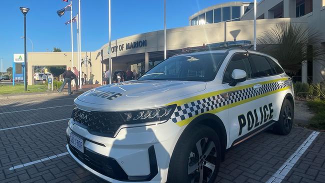 Half a dozen police vehicles surrounded the Marion council building on January 25. Picture: Emily Jarvis.