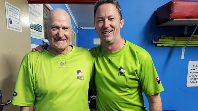 Barry Lewis (left) with Adelaide Footy League umpire manager Colin Rowston. Picture: Adelaide Footy League