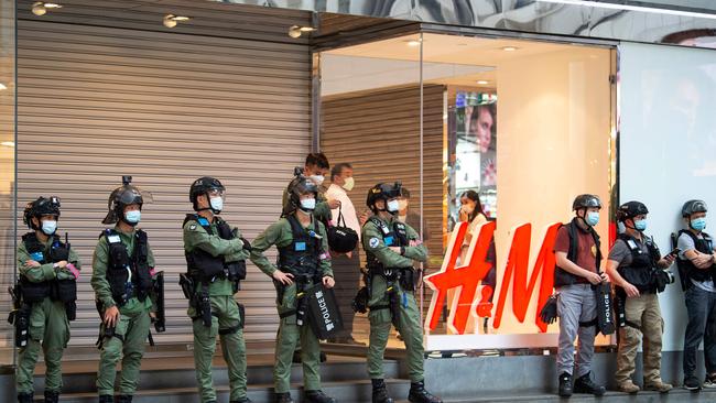 Hong Kong police officers during a protest in Hong Kong this month. Picture: AFP.