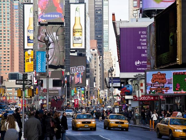 The job earns nearly as much as the mayor himself. Pictured, Times Square. 