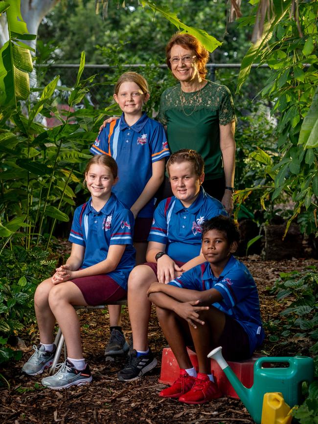 Jingili Primary School principal Carin Symonds is retiring. She is pictured here in the kitchen garden at the primary school with students Tahlia Szyc, Matilda Pratt, Bradley Peacock and Kasman Babui-Lowe. Picture: Che Chorley