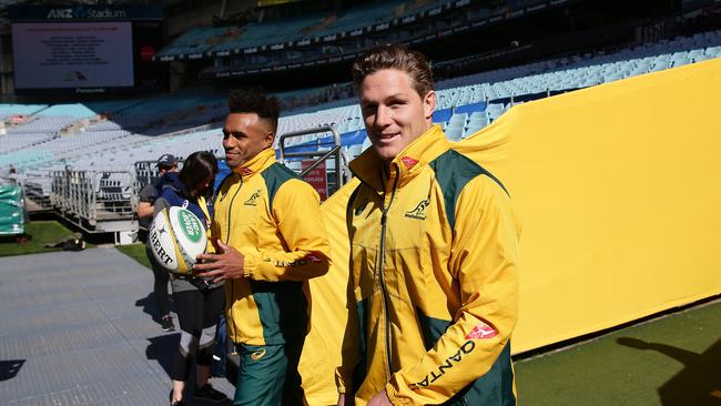 Will Genia and Michael Hooper during the Wallabies captain's run at ANZ Stadium.