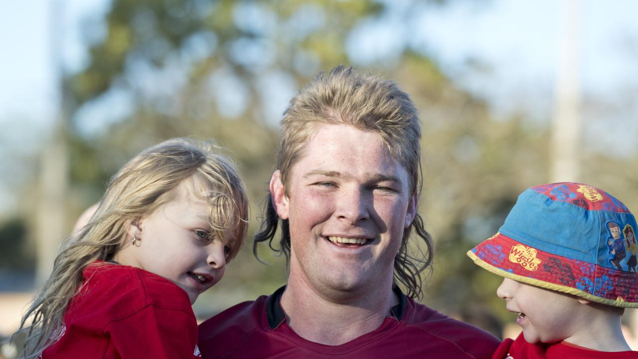 Drew Jackson with children Nellie and Hank Jackson after the 2019 grand final. Photo: Nev Madsen