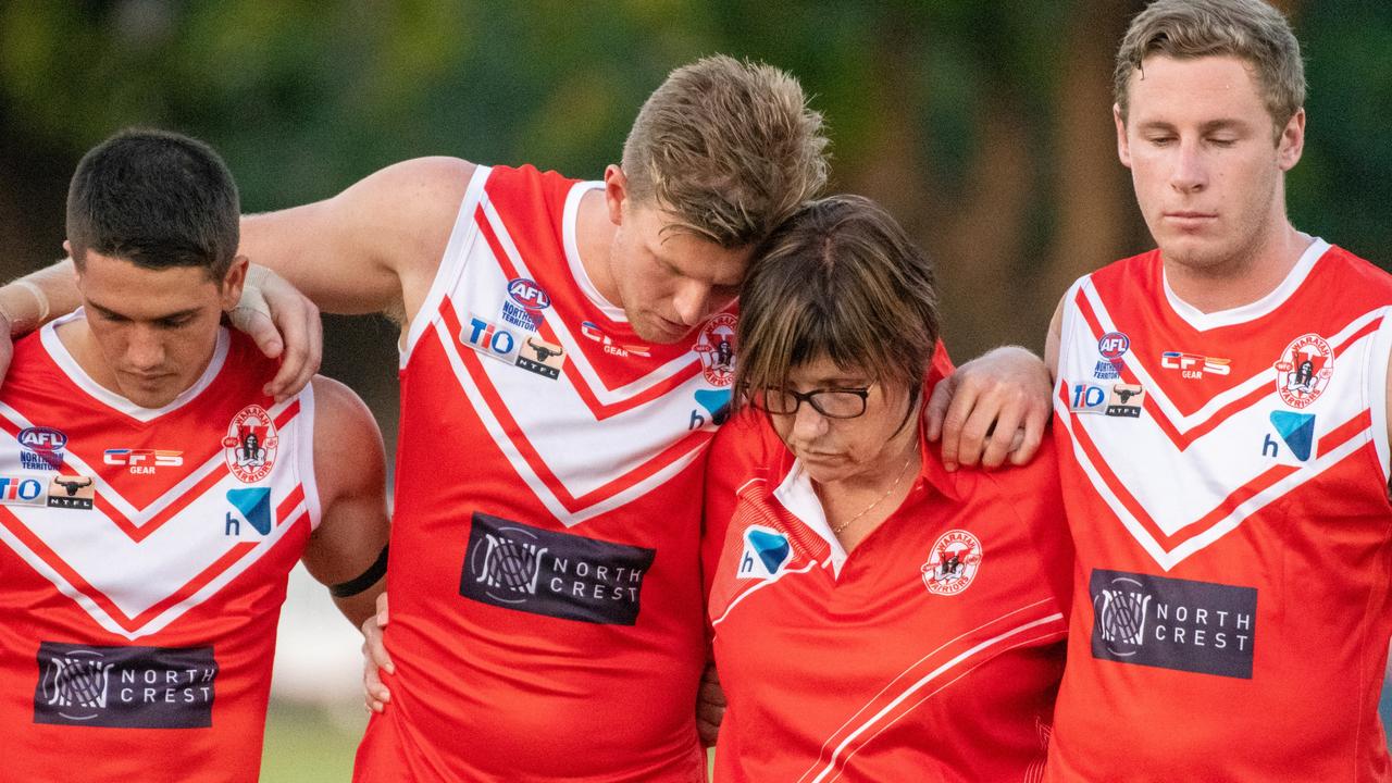 The Waratahs pay tribute to late, great ruckman Alexander ‘Rooch’ Aurrichio at the first game under lights at Gardens Oval. Picture: Aaron Black/AFLNT Media