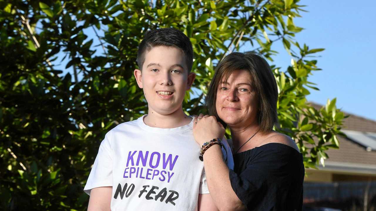 LIFE CHANGING: Jai and Michelle Whitelaw from Yamanto. Jai suffers from epilepsy. There is a new hotline to help sufferers and families. Picture: Rob Williams