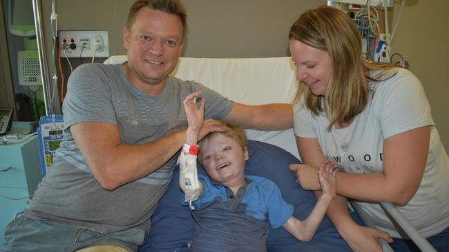 Harrison Pennicott at the Royal Children's Hospital with parents Jamie and Leesa. Picture: Kiel Egging.