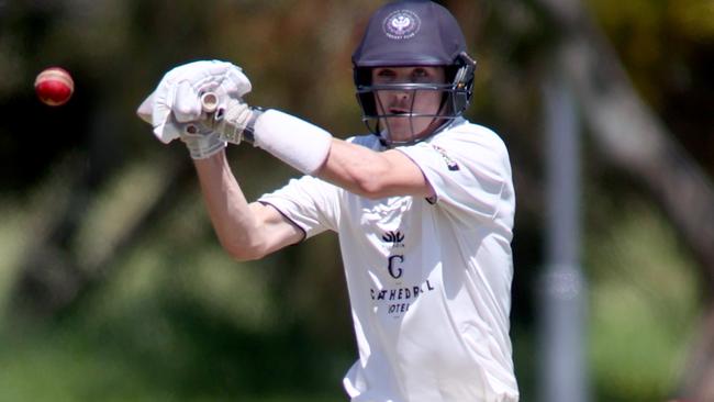 Sam Elder attempts a pull shot for Adelaide University against Tea Tree Gully. Picture: Kelly Barnes