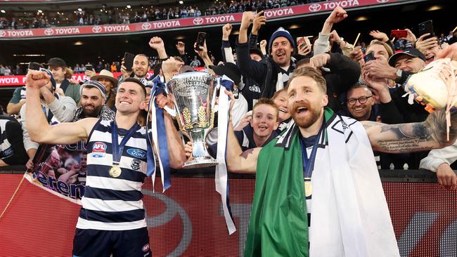 MELBOURNE, SEPTEMBER 24, 2022: 2022 AFL Grand Final between the Geelong Cats and Sydney Swans at the MCG. Mark O'Connor and Zach Tuohy celebrate the win. Picture: Mark Stewart