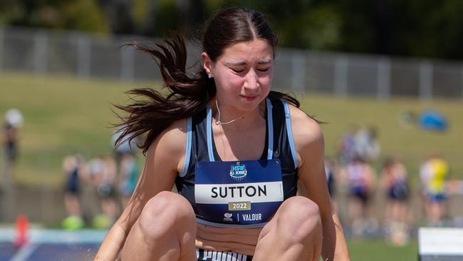 Action in the girls long jump 15 years final.