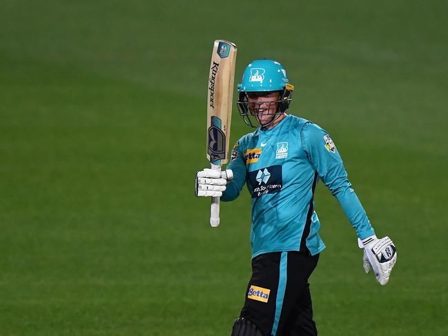 LAUNCESTON, AUSTRALIA - OCTOBER 30: Grace Harris of the Heat raises the bat after scoring a half century during the Women's Big Bash League match between the Brisbane Heat and the Hobart Hurricanes at University of Tasmania Stadium, on October 30, 2021, in Launceston, Australia. (Photo by Steve Bell/Getty Images)