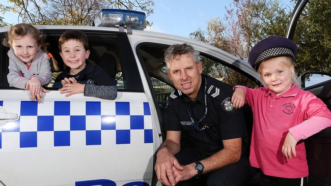 Leading Sen-Constable Andrew Downes at Swan Hill South Kindergarten — his daughter was tragically killed at a pedestrian crossing.