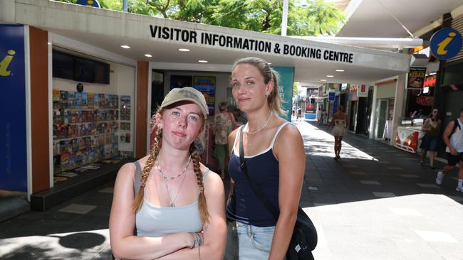 The Surfers Paradise tourist information booth in Cavill Ave Mall is being closed and its staff made redundant by council and Experience Gold Coast. Scottish tourists Rachel Rutherford and Aimee Collins think its a bad idea. Picture Glenn Hampson