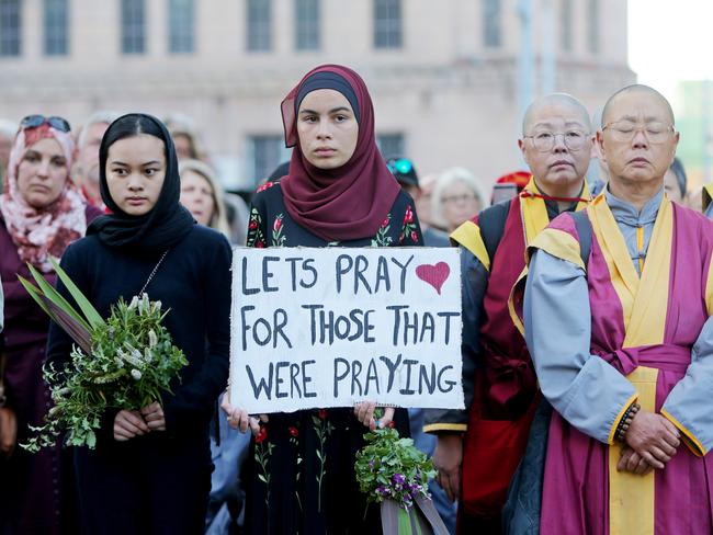 Messages of peace, love and support were displayed by attendees of Hobart's vigil for Christchurch at Franklin Square. Picture: PATRICK GEE