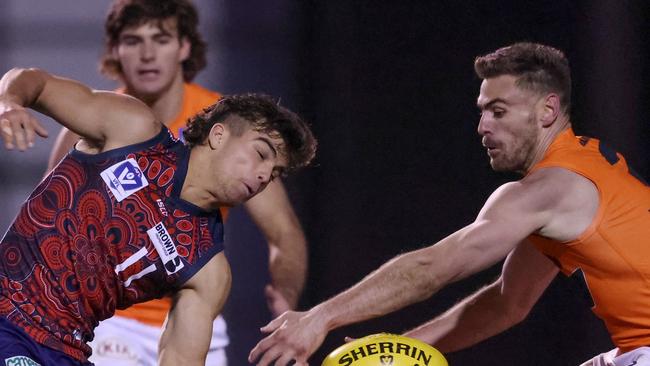 George Grey (left) battles it out with GWS star Stephen Coniglio at Casey Fields in July. Pic: AFL PHOTOS