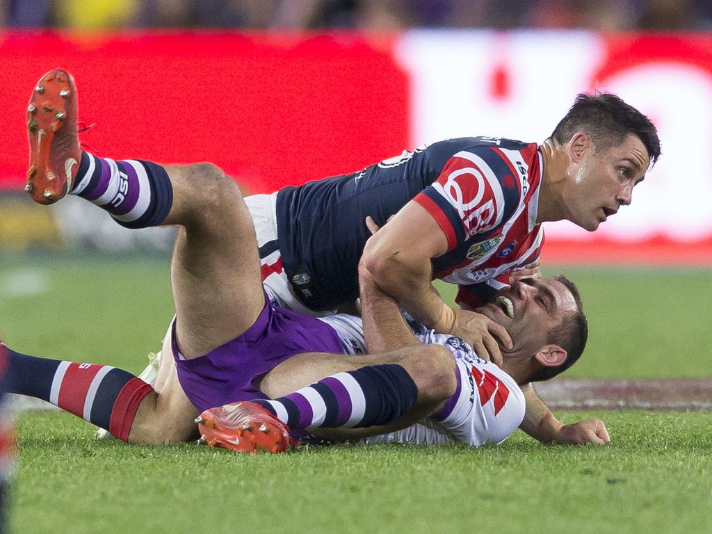 Cameron Smith and Cooper Cronk. Picture: AAP Image/Craig Golding