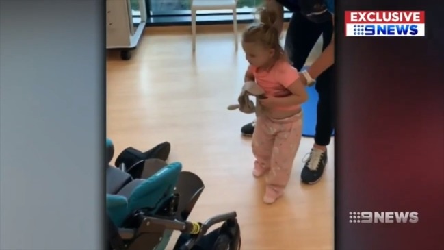 Hayley Henwood is learning to walk and talk again after she was struck down by the flu, Nine News reports.