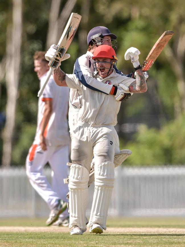 Claye Beams celebrates after hitting the winning runs to claim a grand final victory for Surfers Paradise. Photo: KPM Sports Images