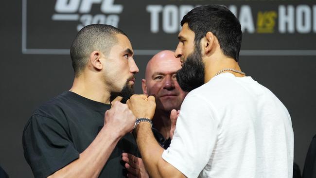 Opponents Robert Whittaker of New Zealand and Khamzat Chimaev of Russia face off during the UFC 308 press conference at Etihad Arena on October 24, 2024 in Abu Dhabi, United Arab Emirates. (Photo by Chris Unger/Zuffa LLC)