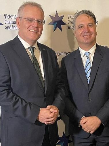 Scott Morrison and Paul Guerra at the breakfast.