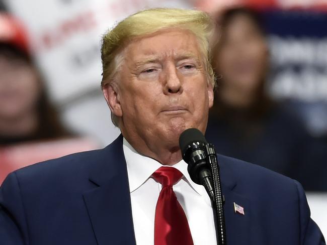 FILE - In this March 2, 2020, file photo, President Donald Trump speaks during a campaign rally in Charlotte, N.C. Trump is resuming in-person fundraising events after a three-month hiatus as his campaign works to maintain a cash advantage over Democrat Joe Biden that it believes is vital to victory in November.  (AP Photo/Mike McCarn, File)