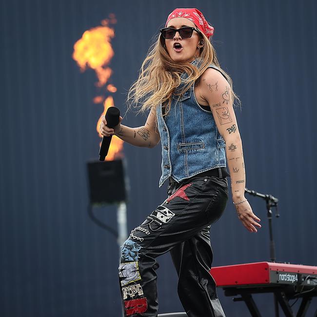 G Flip on stage before the AFLW grand final. Picture: Ian Currie