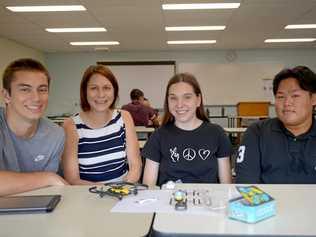 Brandon Waine, Dr Reyna Zipf, Abbey Downing and Juan Miguel focus on STEM education for primary school students. Picture: Jann Houley