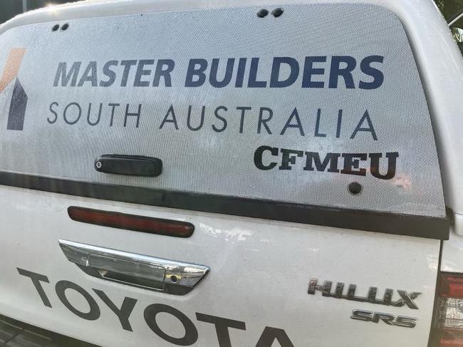 Damage to Master Builders Association vehicle including a CFMEU sticker placed on a car. Pictures: supplied